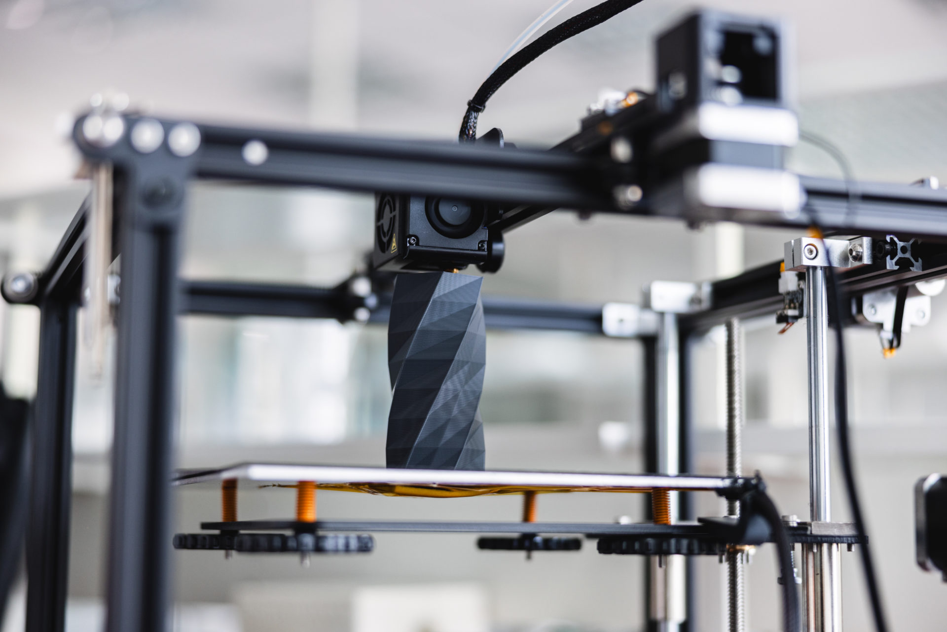 Close-Up Of A 3D Printer Printing A Three Dimensional Object