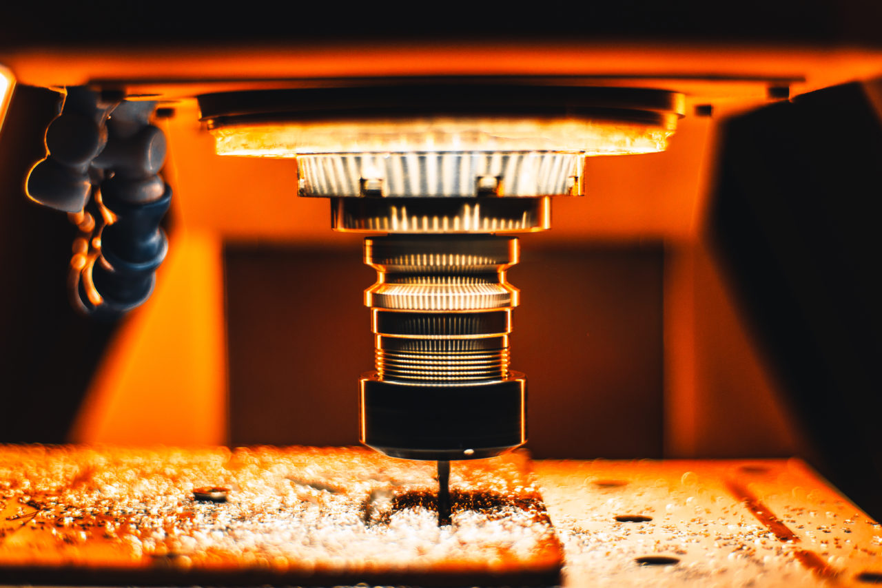 Milling CNC maching in strong orange light